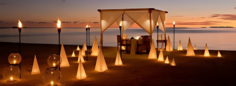 A romantic beach setting with candles and a gazebo at Love Lake.